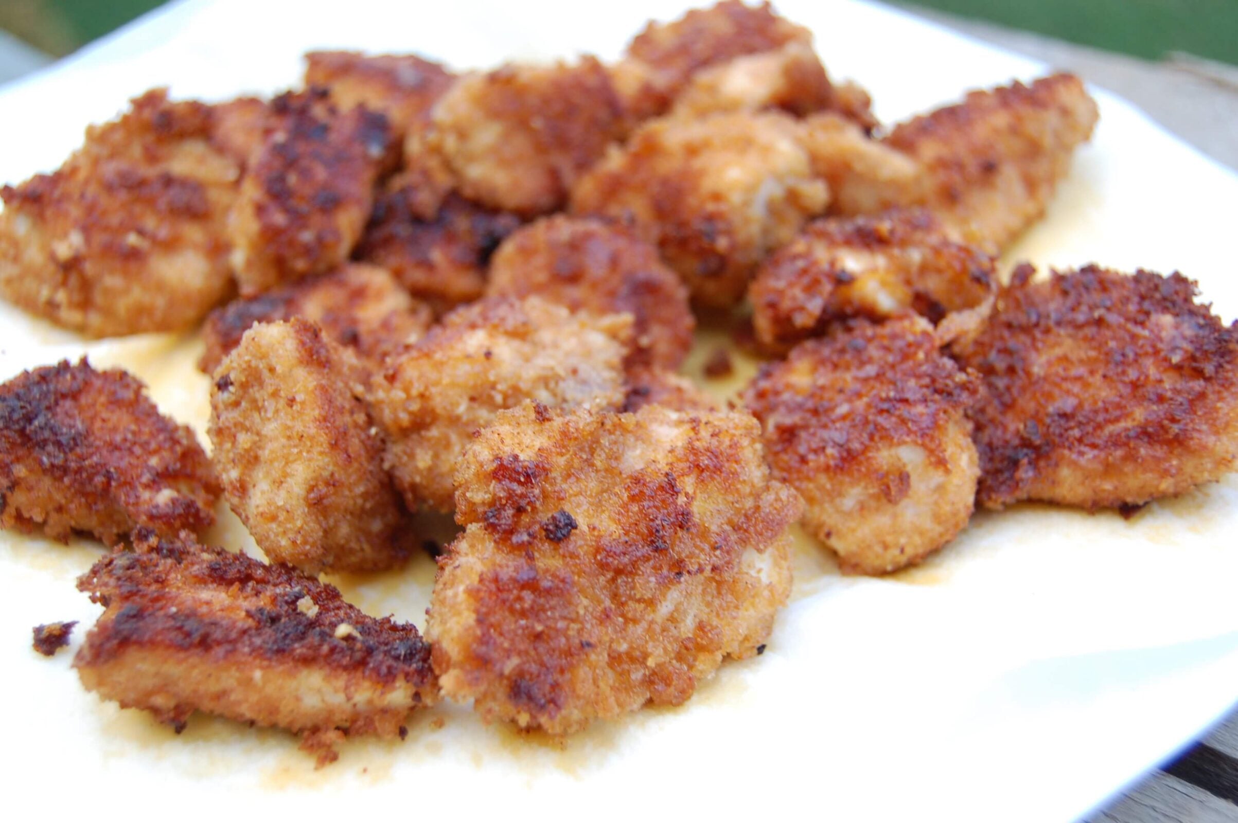 Homemade Chicken Nuggets recipe on a white plate