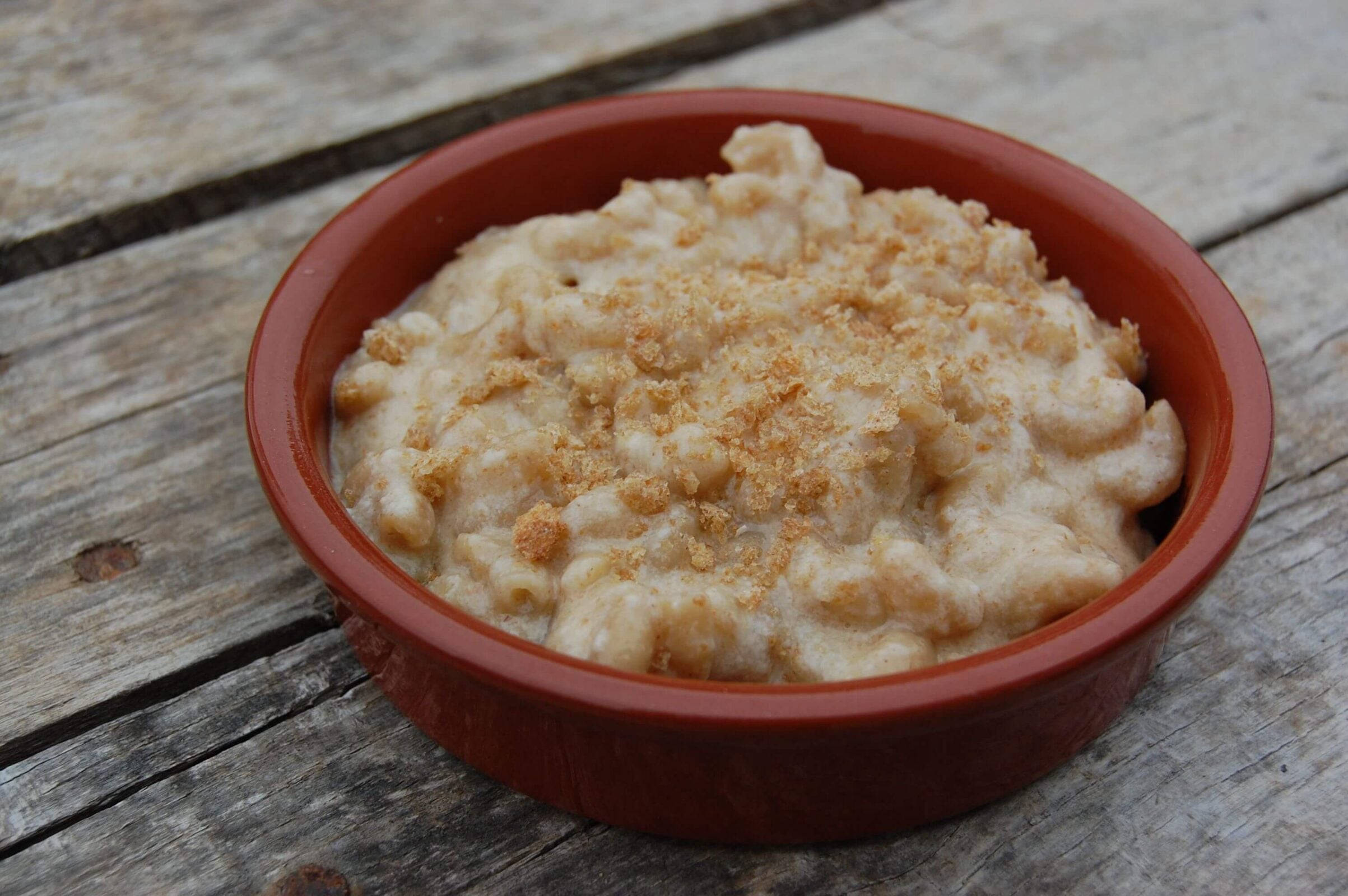 Whole wheat mac and cheese roux recipe with breadcrumbs in a small bowl