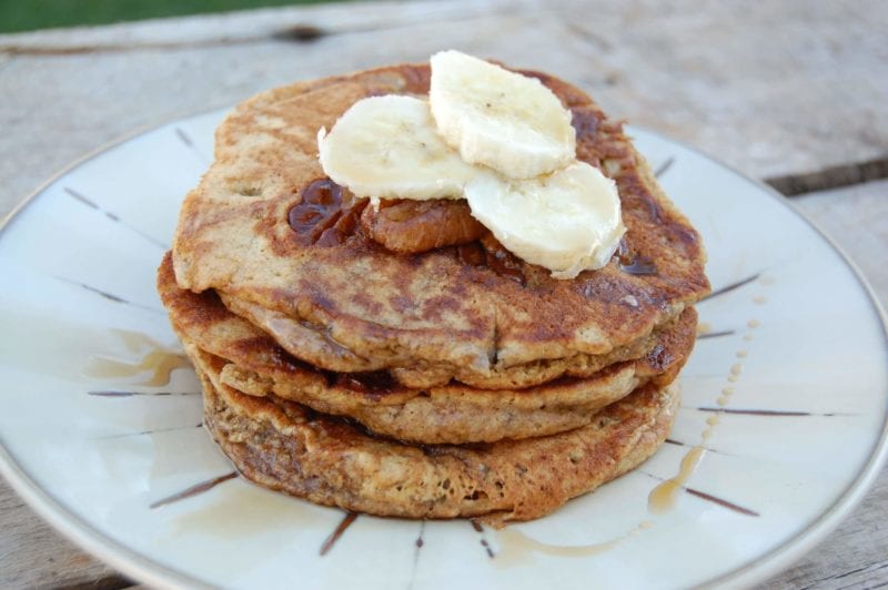 Homemade whole-wheat banana pancakes on a plate.