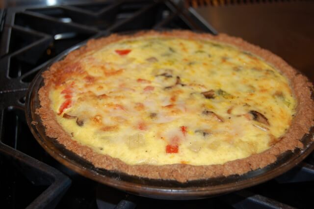 Homemade quiche in a pie dish.